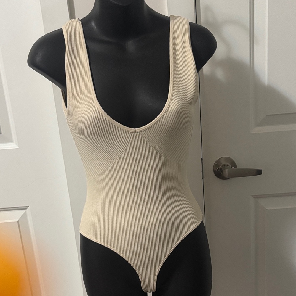 2/$20 Dynamite Cream Ribbed Low Cut Bodysuit